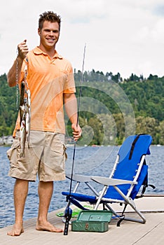 Man fishing in pier