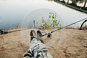 Man fishing spinning on the river