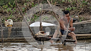 Man fishing, Tonle Sap, Cambodia