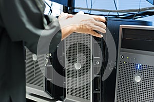 Man fix server network in data center room