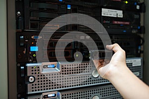 Man fix server network in data center room