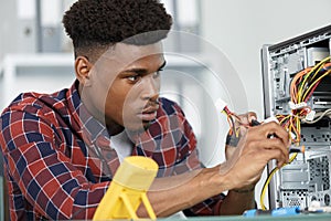 Man fixing broken pc