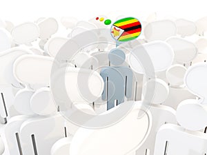 Man with flag of zimbabwe in a crowd
