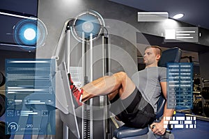 Man flexing leg muscles on gym machine