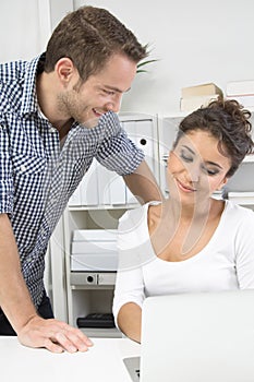 Man flirting with his colleague in office