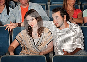 Man Flirting in Theater photo