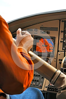 Man in floatplane cockpit