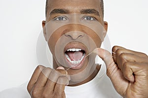 Man Flossing Teeth photo