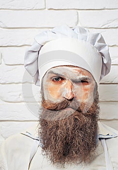 Man with flour on face