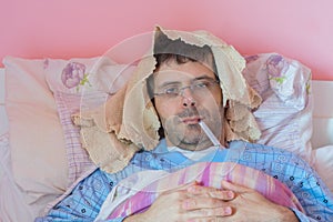 Man with flu into bed