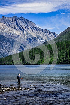 Man Fly Fishing in Kintla Lake