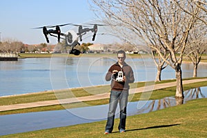 Man Flying a High-Tech Camera Drone