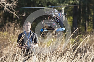 Man flying uav helicopter