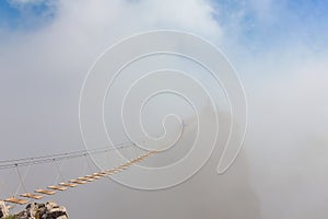 Man in fog over chasm