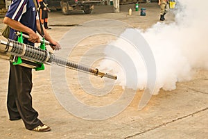 Man fogging chemical to anti mosquitos