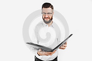 Man with a folder in his hands, on a white background, businessman with glasses