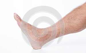 Man foot on white background