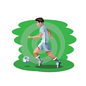 Man footballer standing with ball.