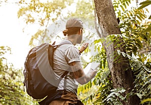 Man in forest alone for trekking