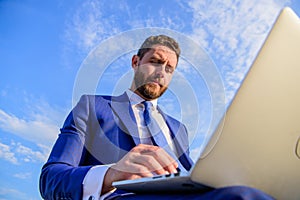 Man formal suit work with laptop blue sky background. Ultimate guide to becoming sales leader. Businessman surfing
