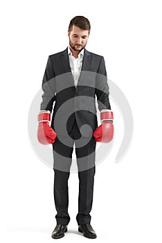 Man in formal wear and boxing gloves