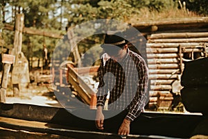 The man found gold. Contemporary lucky prospector found lot of gold in creek when panning sand