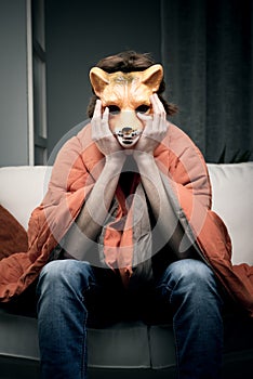 Man with fox mask