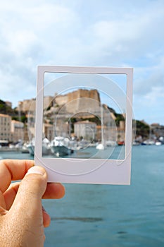 Man with a frame in Bonifacio, Corsica, France