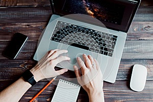 Man freelancer is working using laptop computer