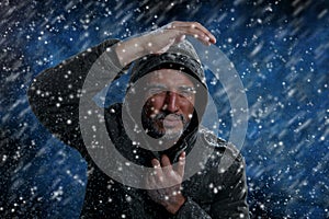 Man Freezing in Cold Weather photo