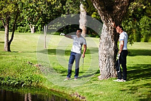 Man, friends and golf with sports for fitness, exercise or hobby together in summer outdoor. Golfers, athlete and male