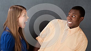 Man Frightened By Angry Woman photo