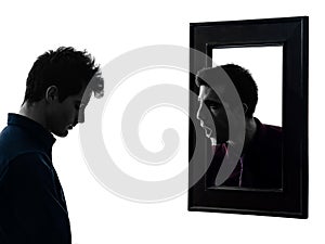 Man in front of his mirror silhouette