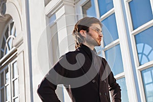 Man in Front of House
