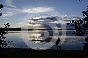 Man in front of a Lake.