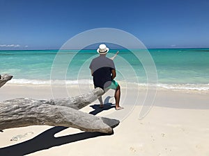 A man in front of the sea thinking about his future