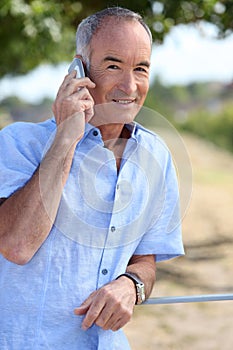Man in front of village