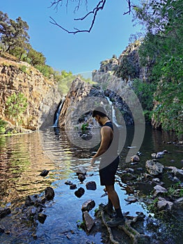 Man in front of a waterfall Guadalix