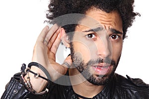 Man in front of a white background doing expressions