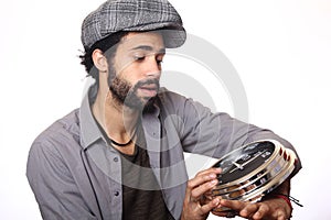 Man in front of a white background doing expressions