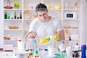 The man frustrated at having to wash dishes