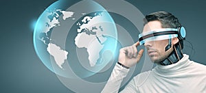 Man with futuristic 3d glasses and sensors