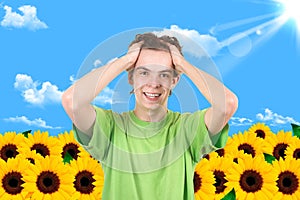 The man in a garden. Sunflower