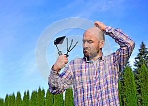 Man with garden tools