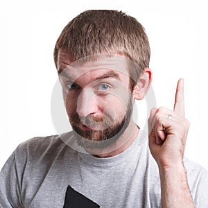 Man gesturing with index finger, remember sign