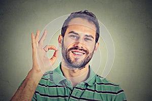 Man gesturing OK sign