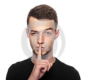 Man gesturing silence.