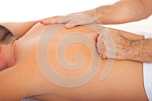 Man getting deep back massage