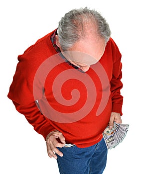 Man getting dollar bills from the pocket