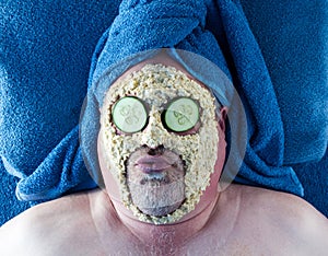 Man Getting Facial With Silly Facial Expression